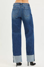 Blue jeans with a white background