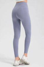 Light purple leggings worn by a person on a white background