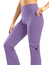 Purple pants worn by a person on a white background