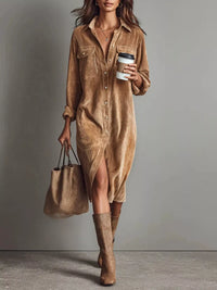Woman wearing a brown suede dress and boots, holding a coffee cup and handbag.