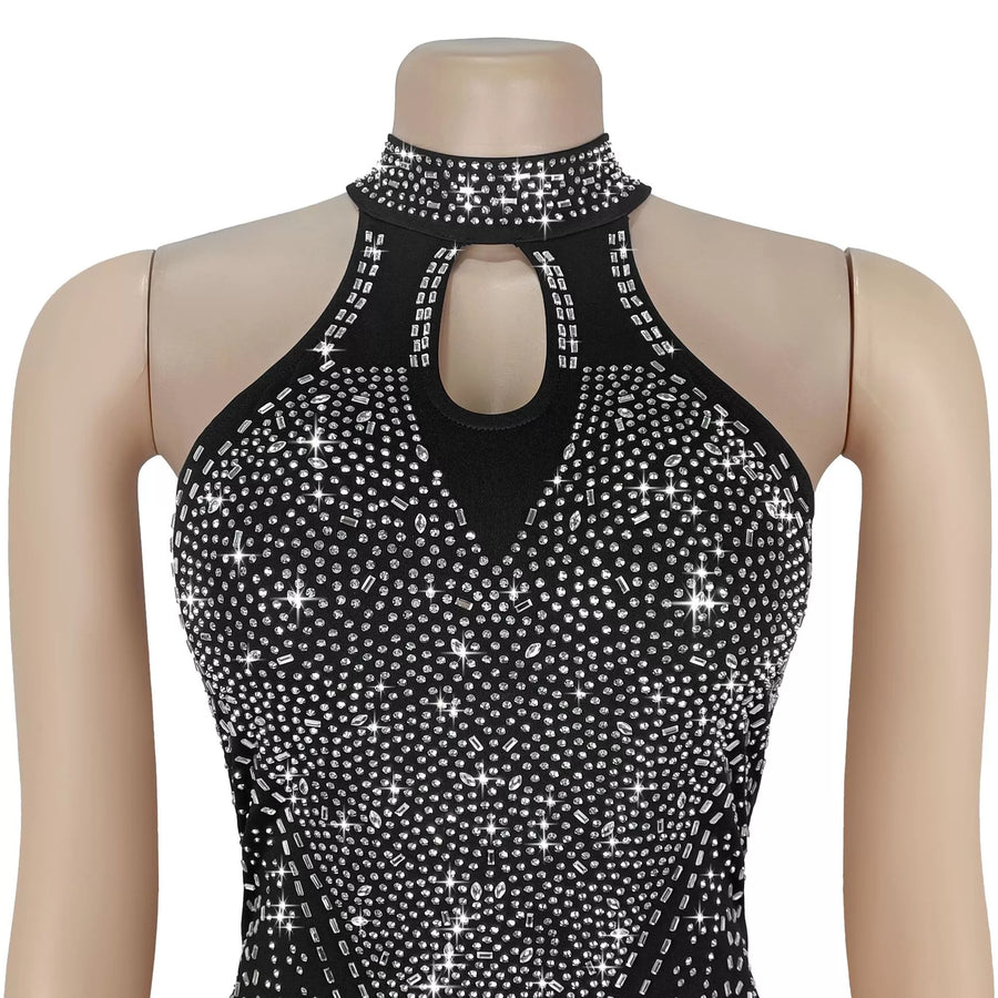 Black halter top with sparkling embellishments on a mannequin against a white background