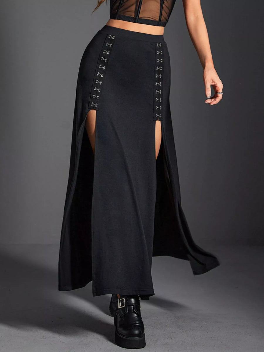 Black long skirt with front slit and lace-up details on a gray background