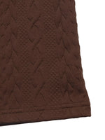Close-up of brown textured fabric on a white background