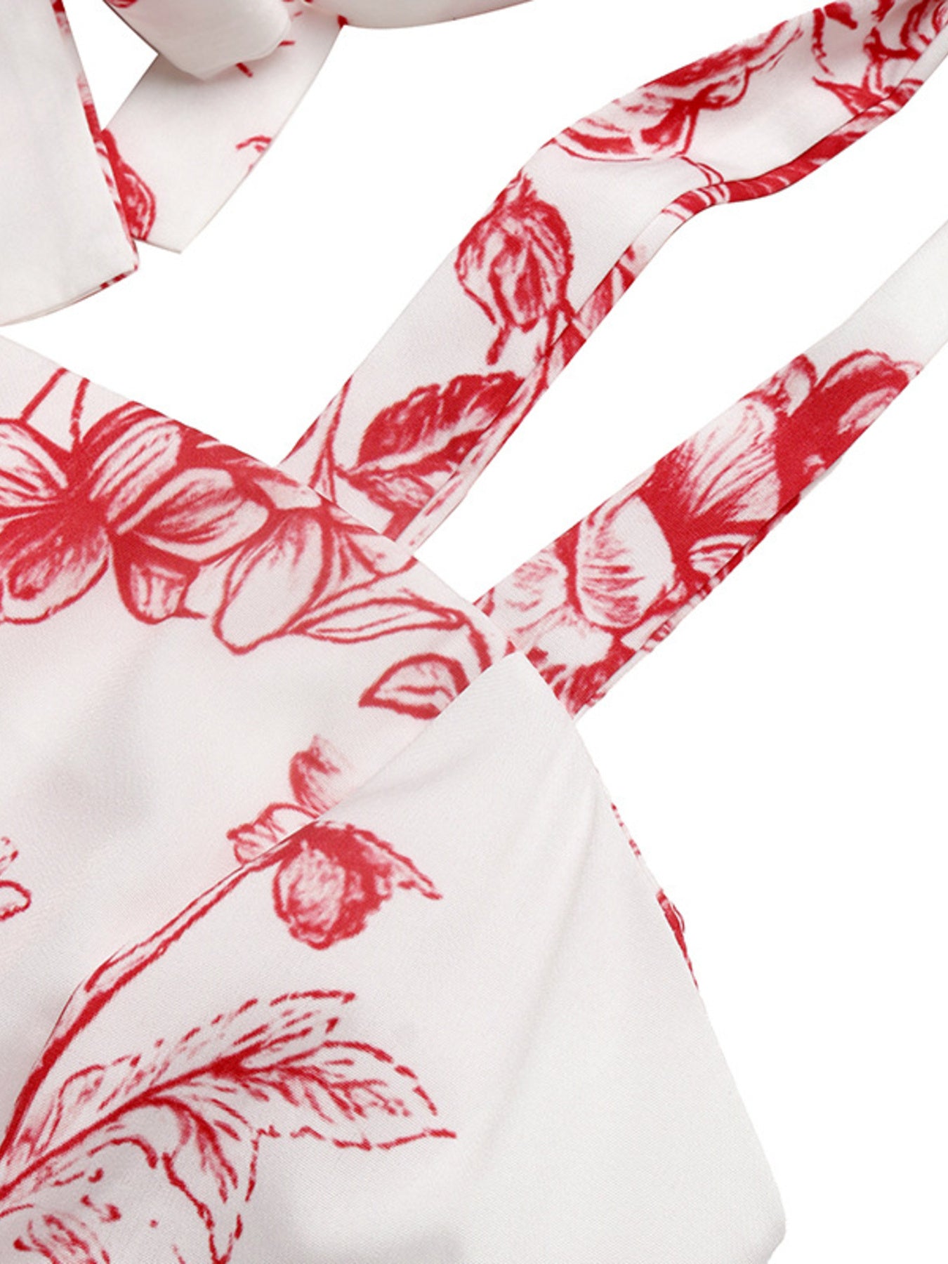 White fabric with red floral pattern