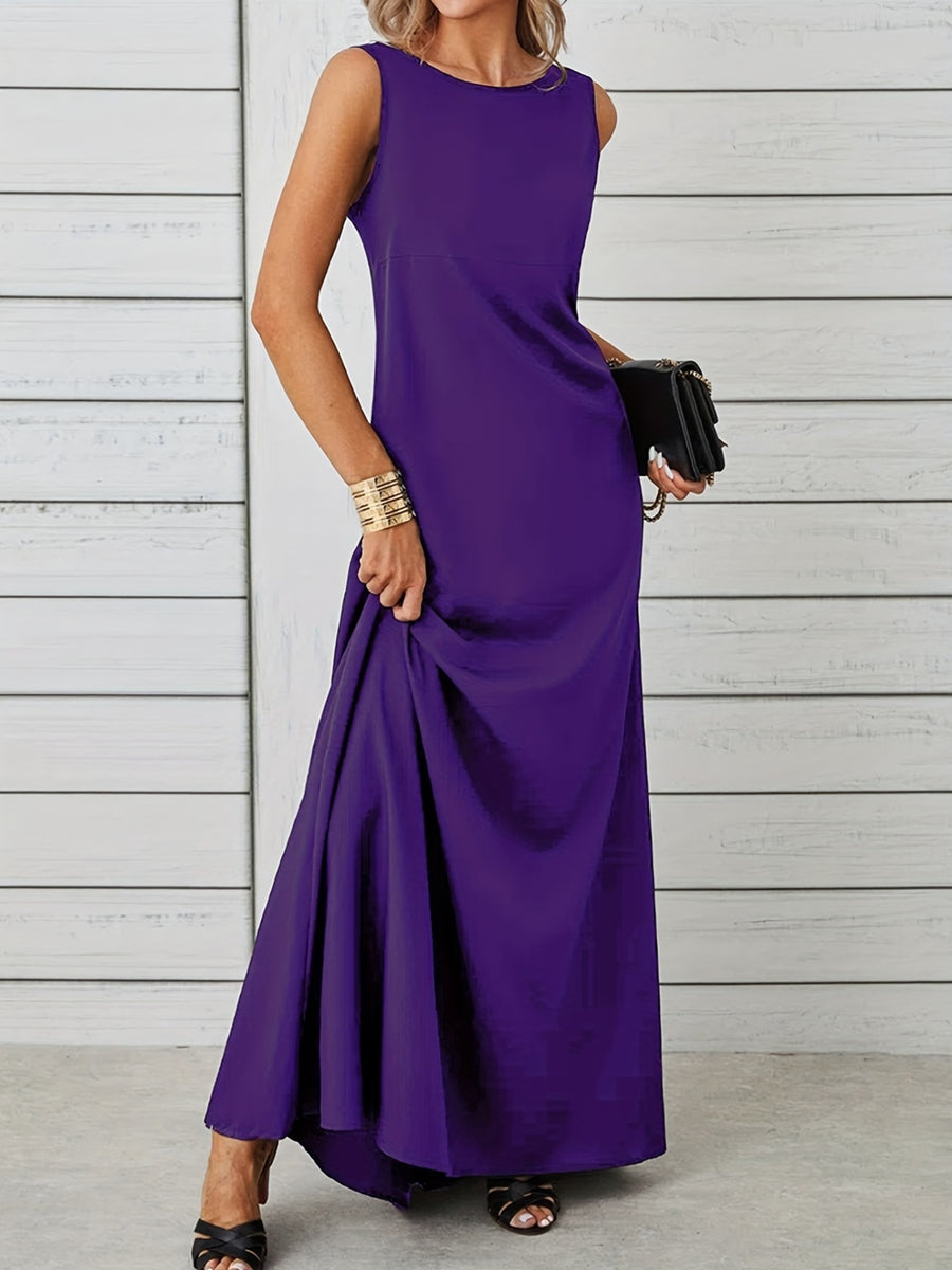 Woman wearing a purple sleeveless dress against a light wooden panel background