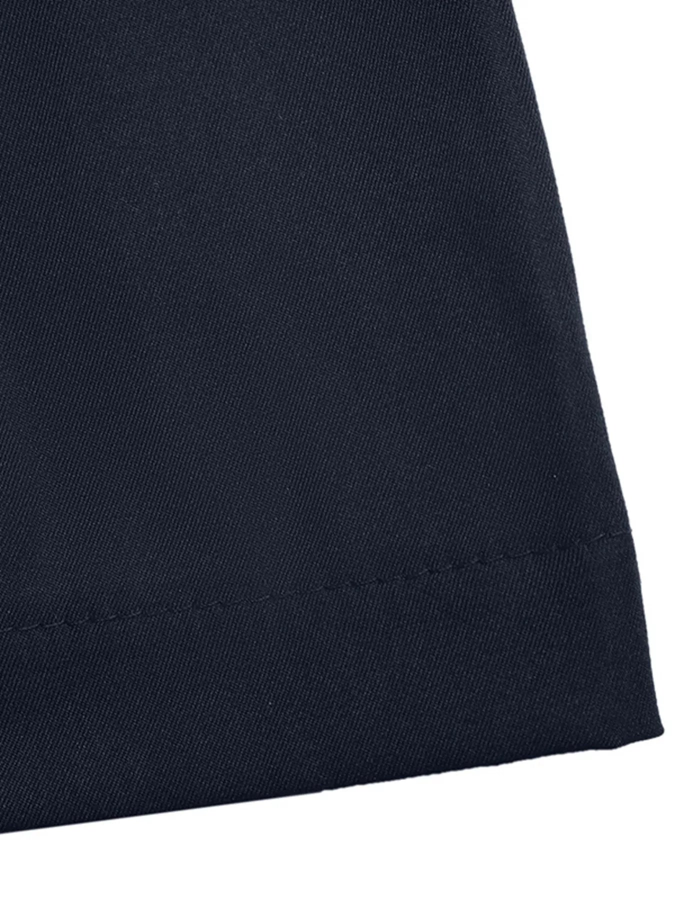 Close-up of a dark blue fabric corner on a white background