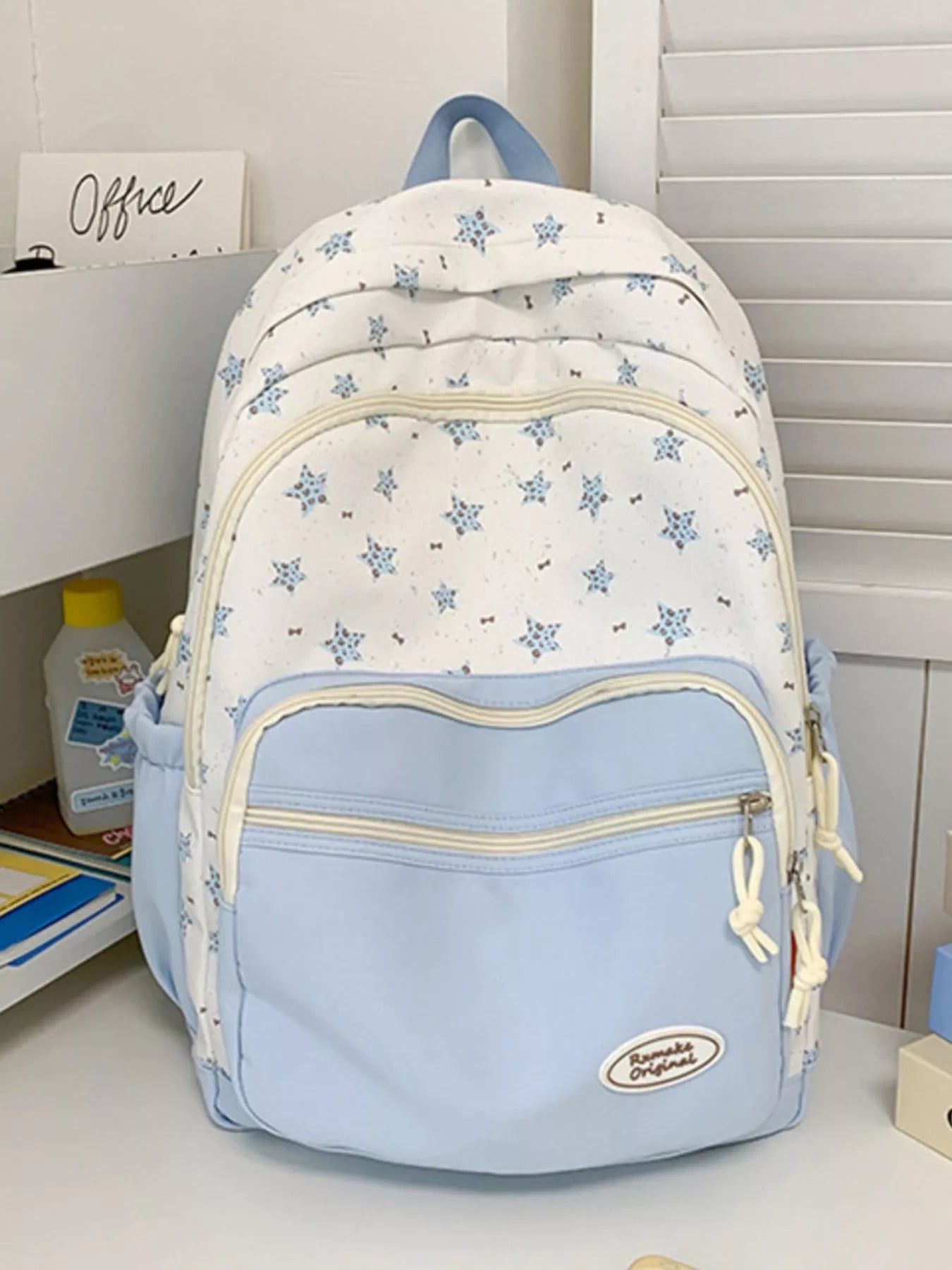 Backpack with snowflake pattern on a white surface