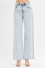 Light blue jeans on a white background