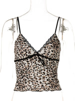 Leopard print top on a mannequin with a white background