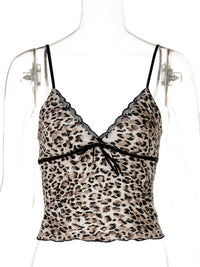 Leopard print top on a mannequin with a white background