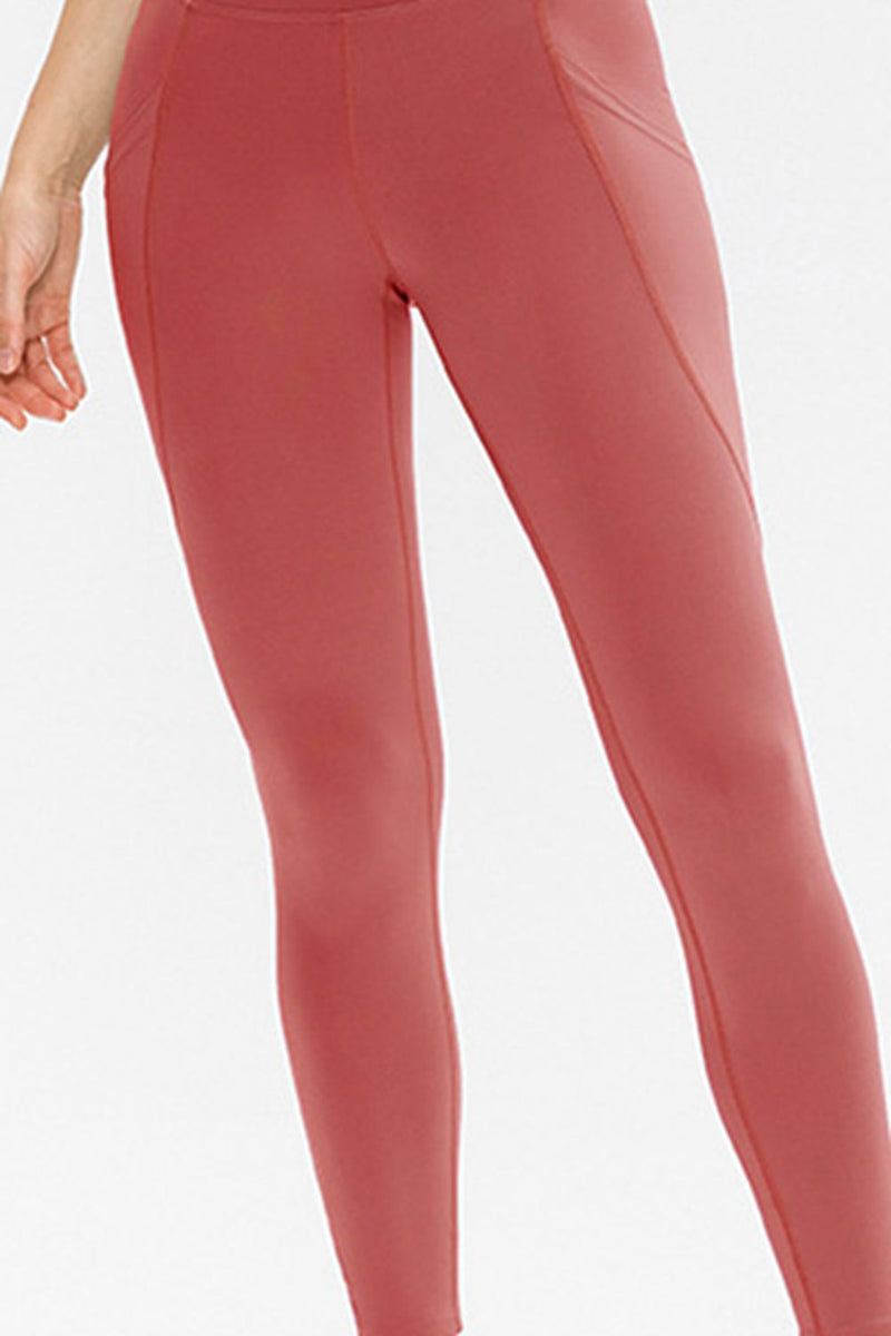 Pink leggings on a white background