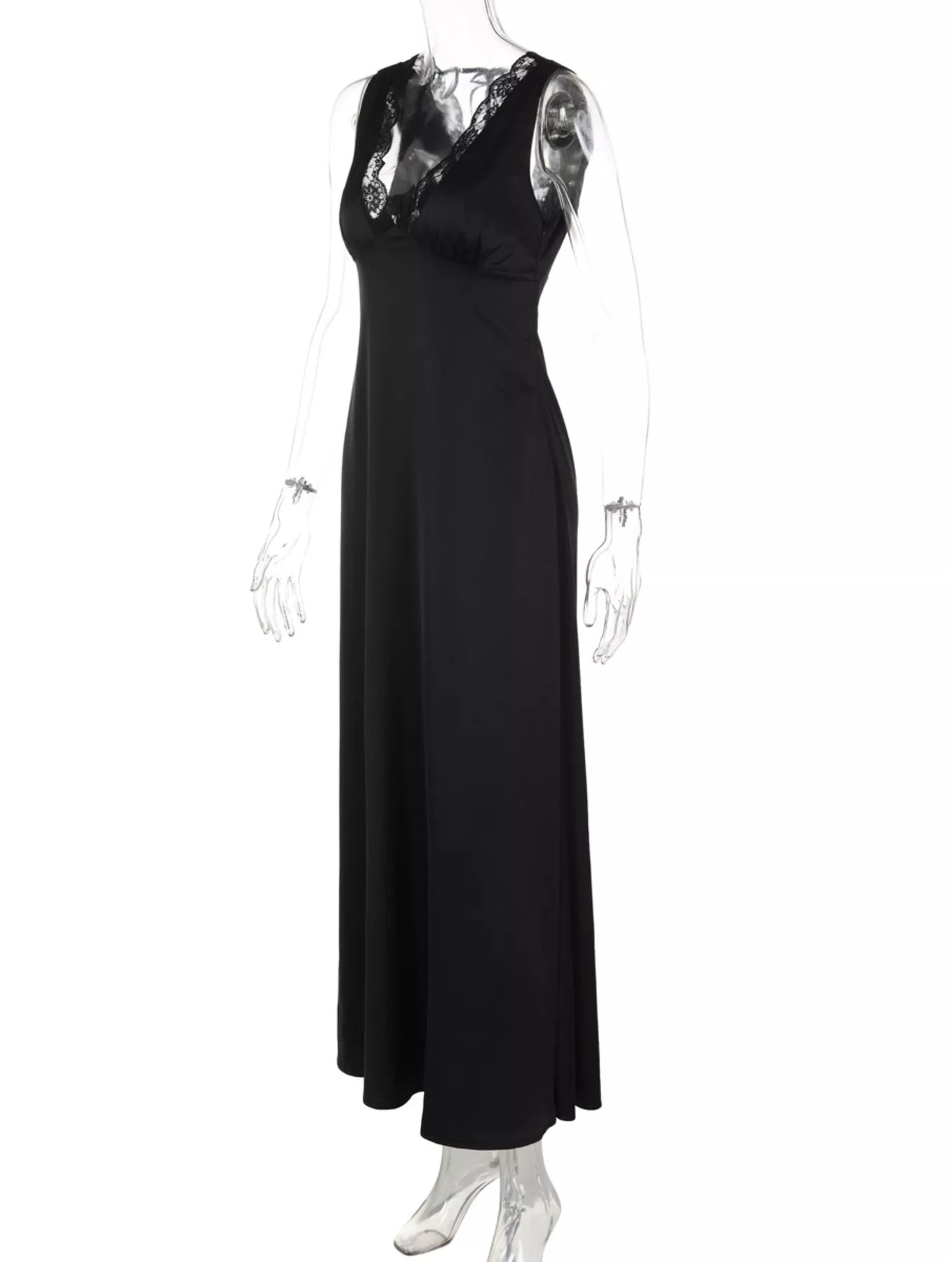 Black evening gown with lace detailing on a white background