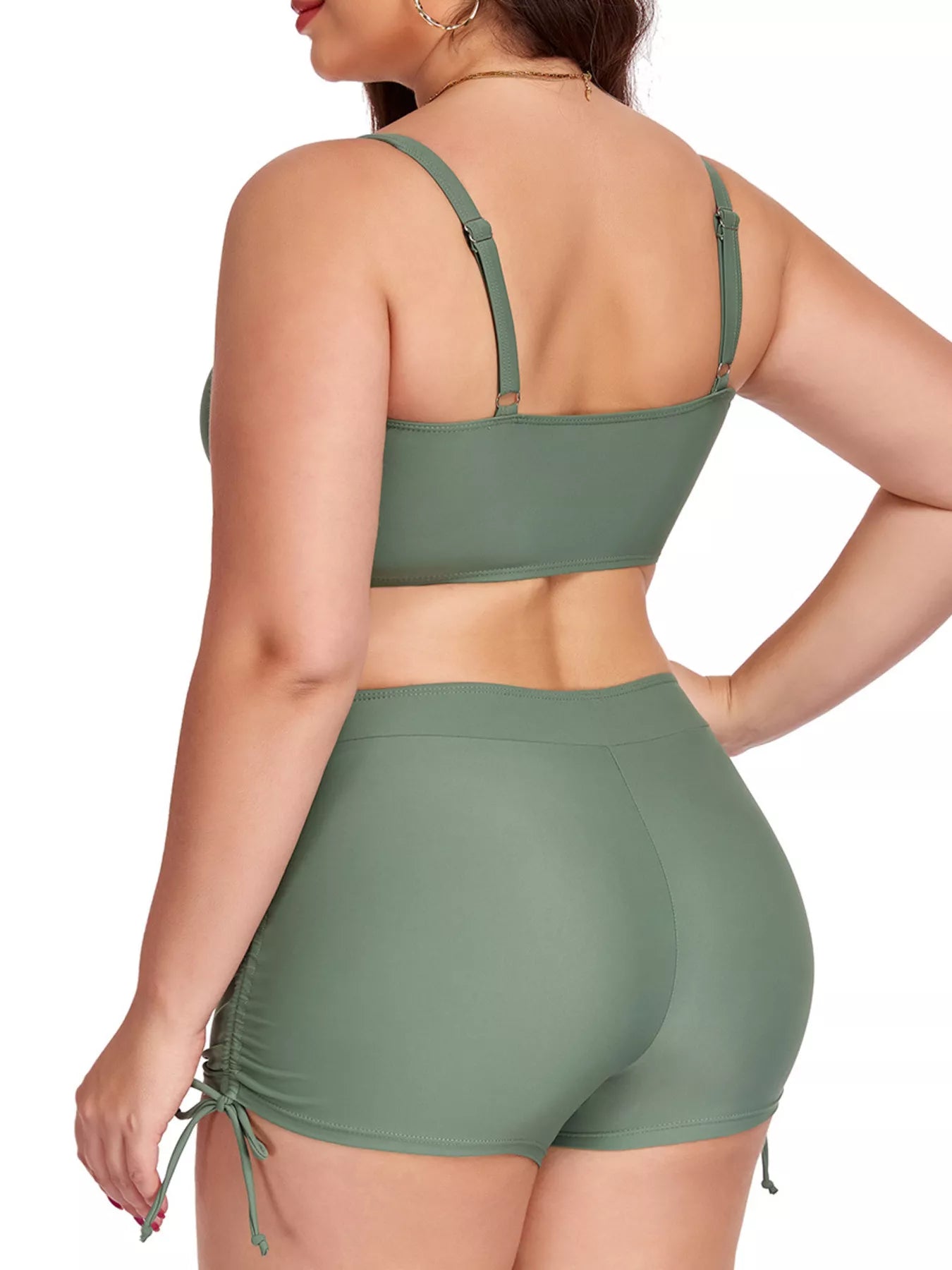 Green bikini set on a white background
