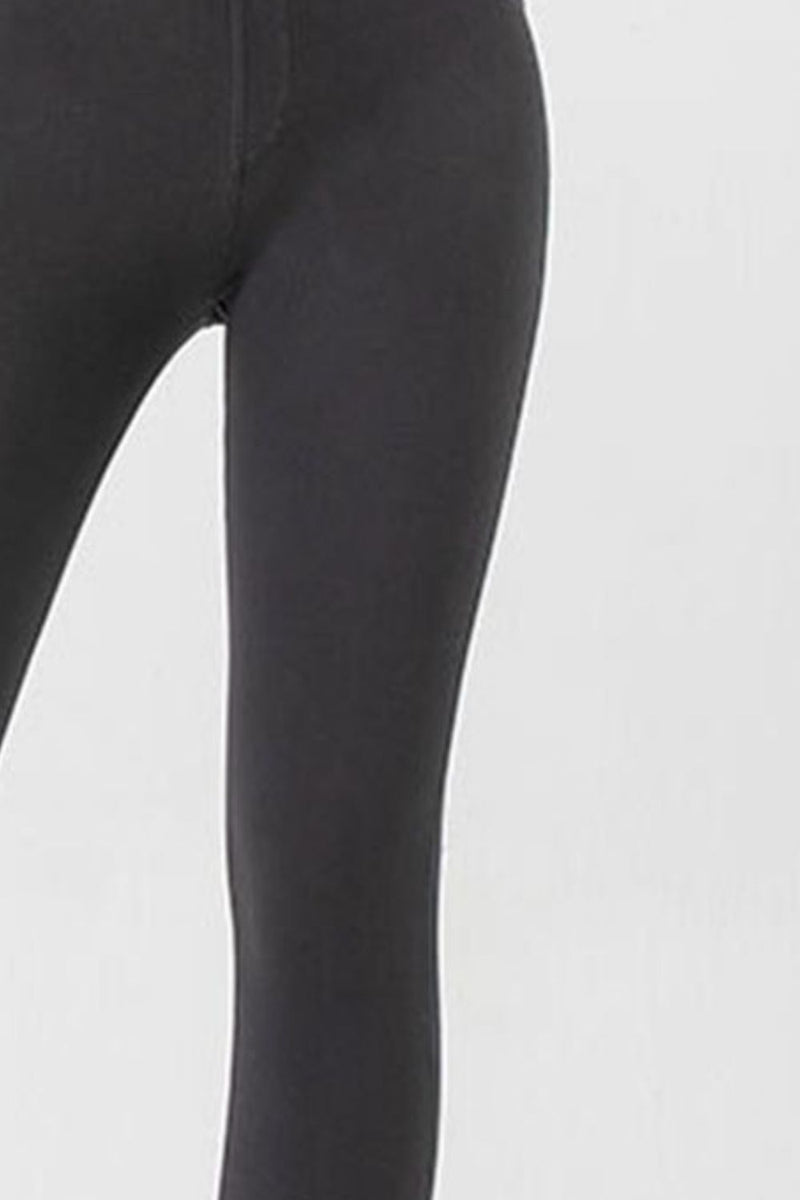 Black leggings on a white background