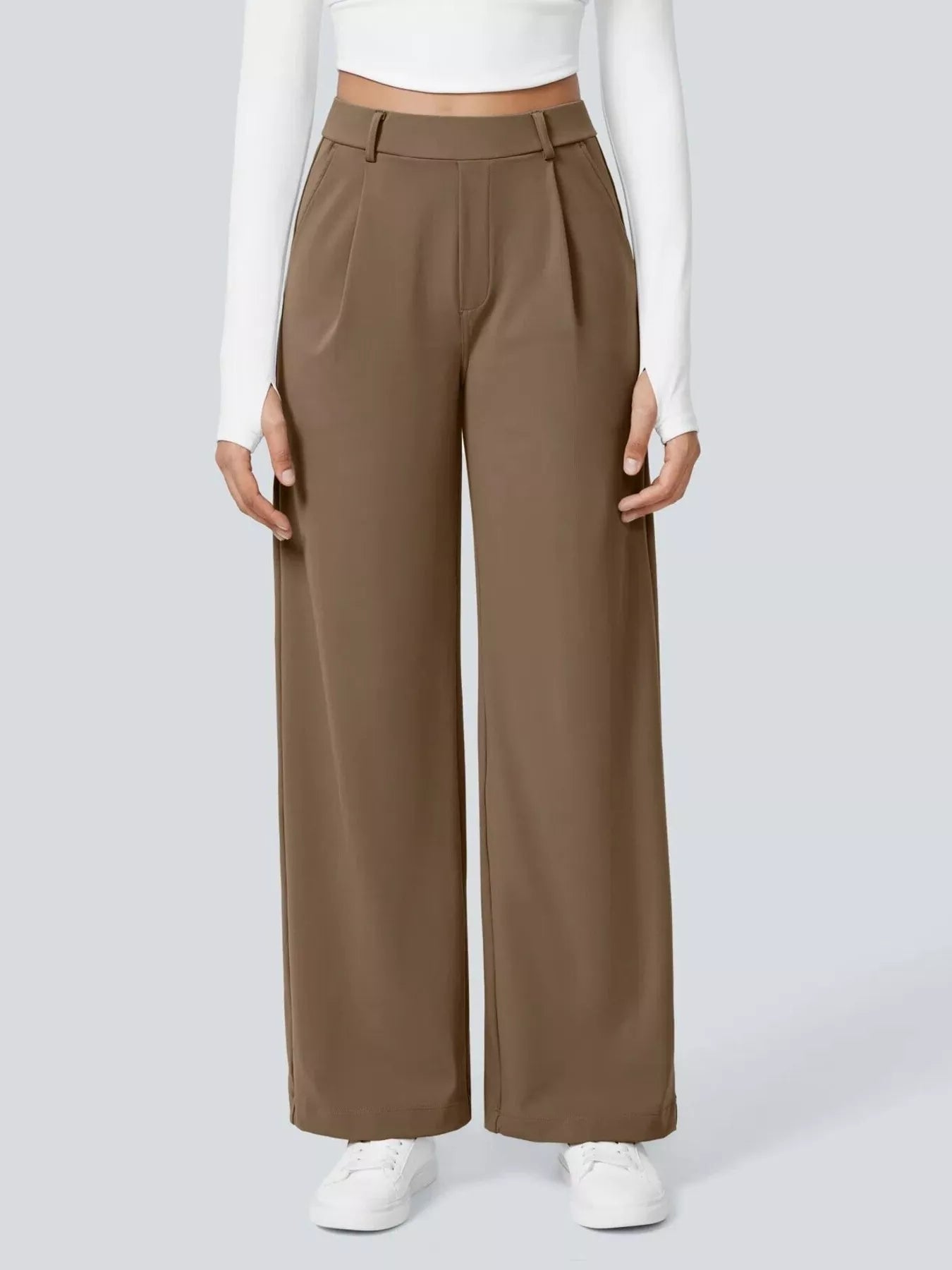 Brown wide-leg pants worn by a person on a white background
