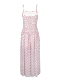 Pink floral dress on a white background