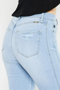 Light blue jeans with a visible brand label on a white background