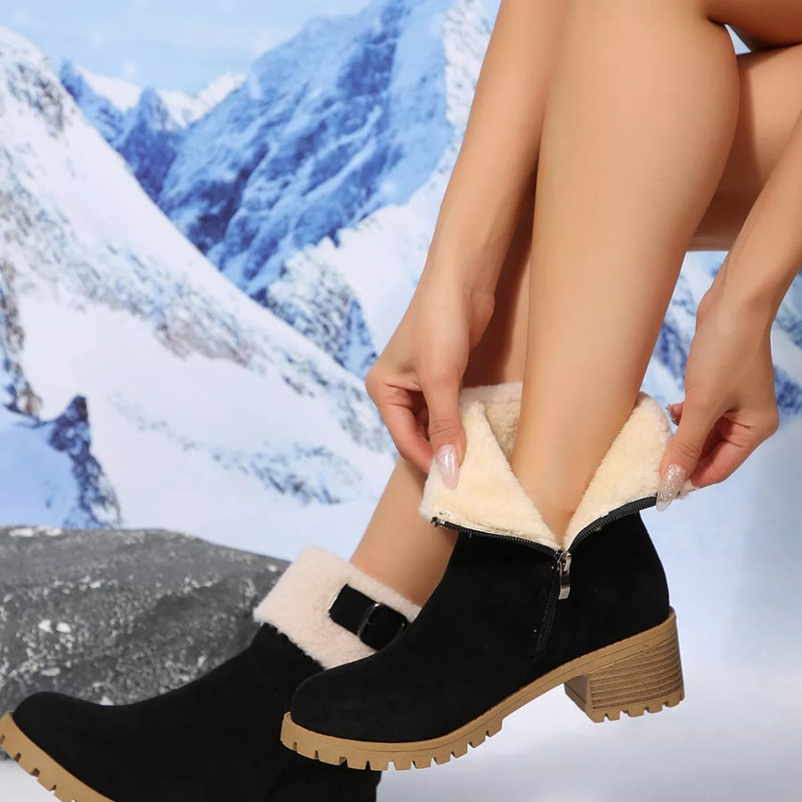 Woman showing the inside of Round Toe Block Heels Boots