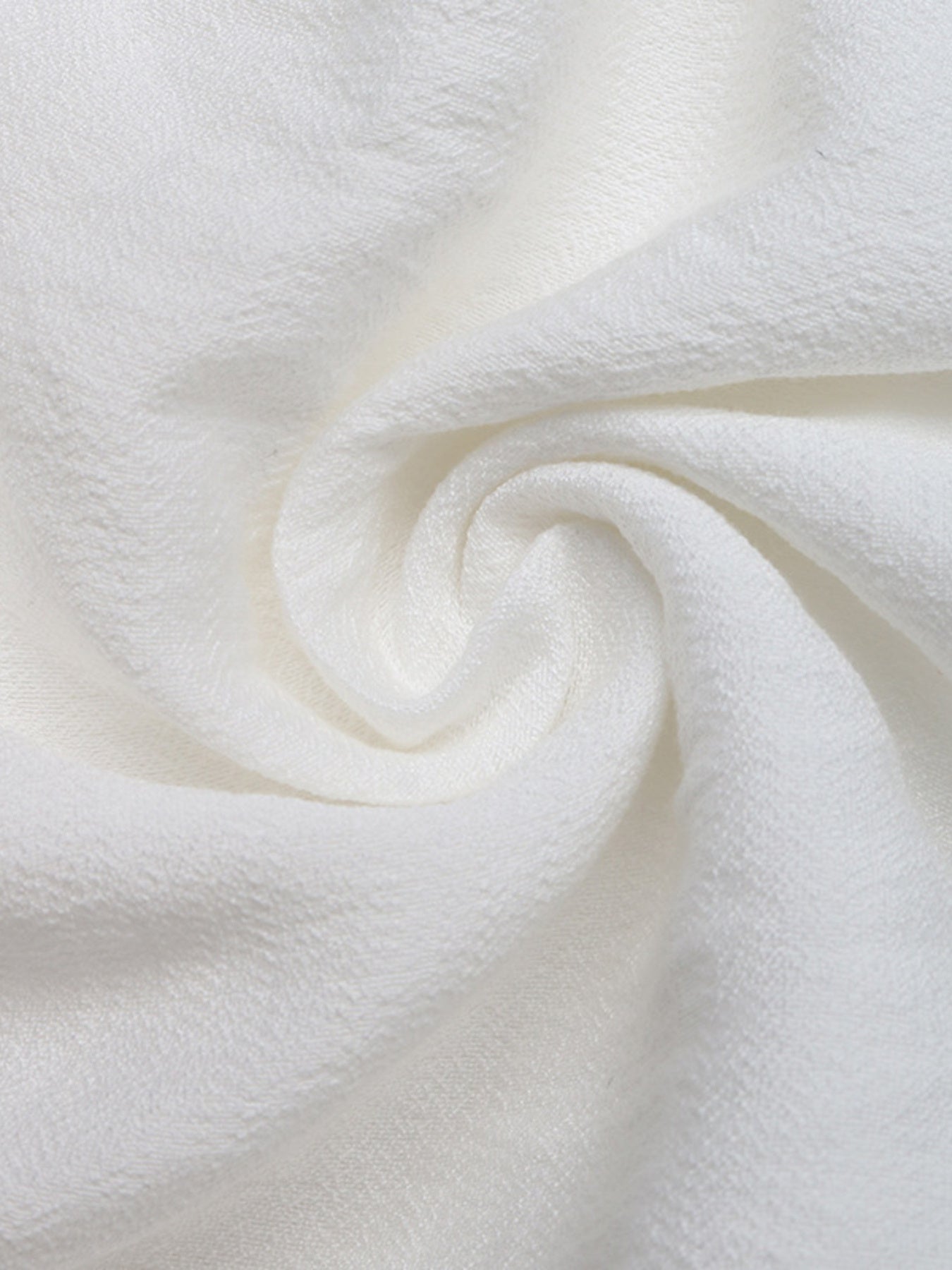 Close-up of white fabric with a soft texture