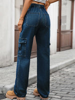 Person wearing blue cargo pants on a street