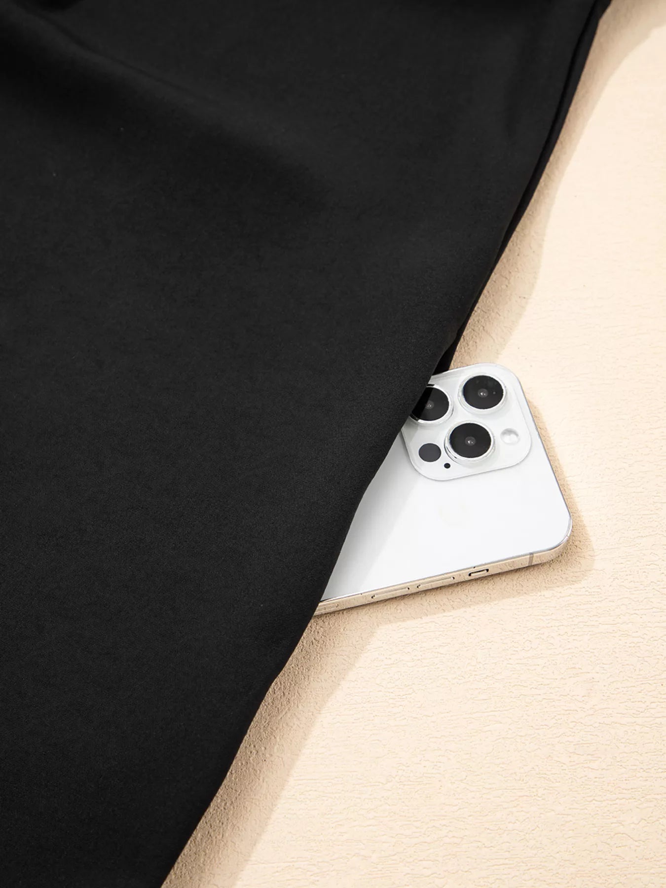 Smartphone with a black and beige background