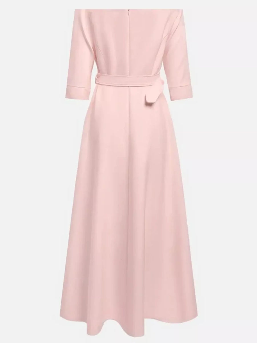 Pink dress with a belt on a white background