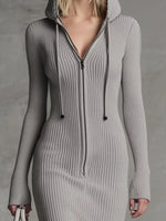 Gray ribbed knit dress with a hood on a plain background