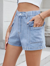 Light blue denim shorts worn by a person with a neutral background