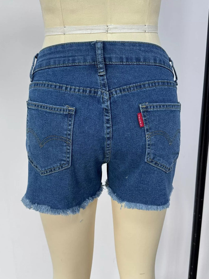 Blue denim shorts on a mannequin against a white background
