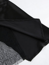 Black fabric with lace trim on a white background