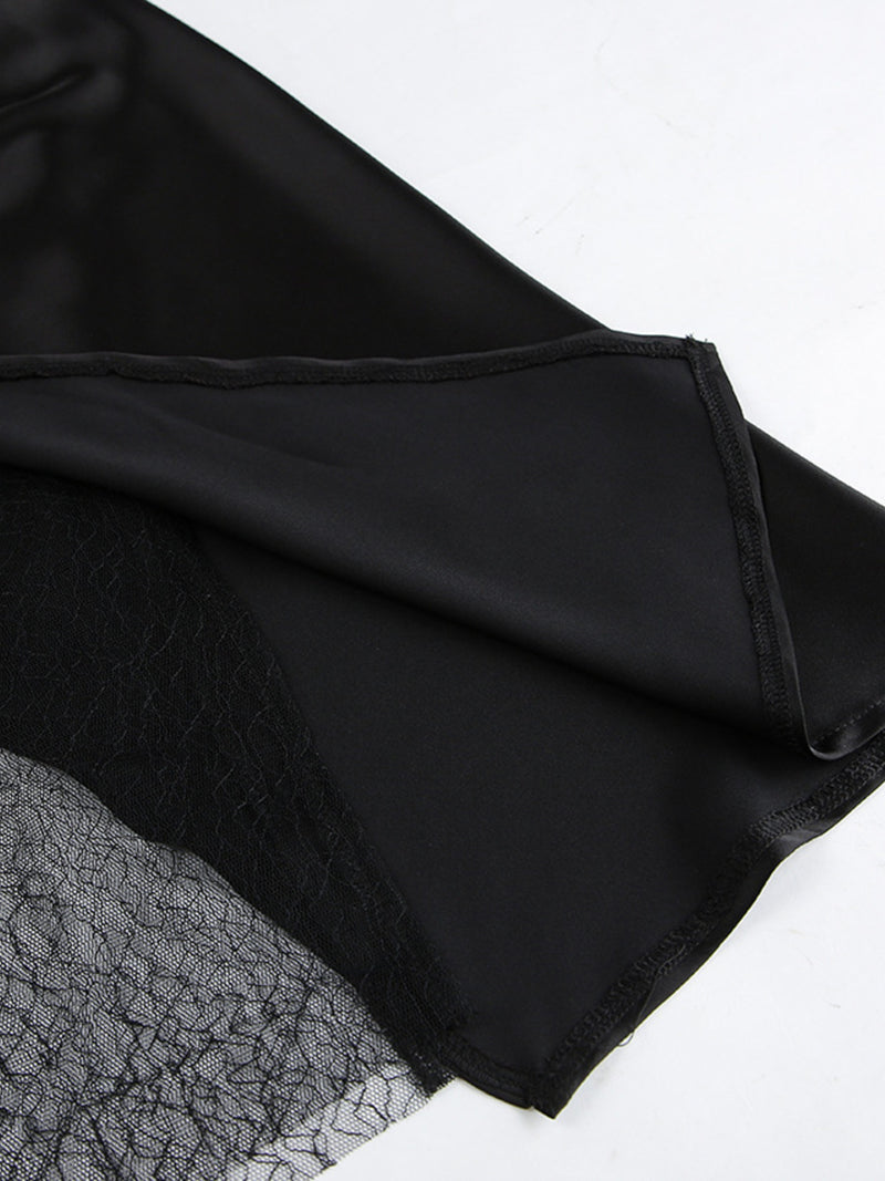 Black fabric with lace trim on a white background