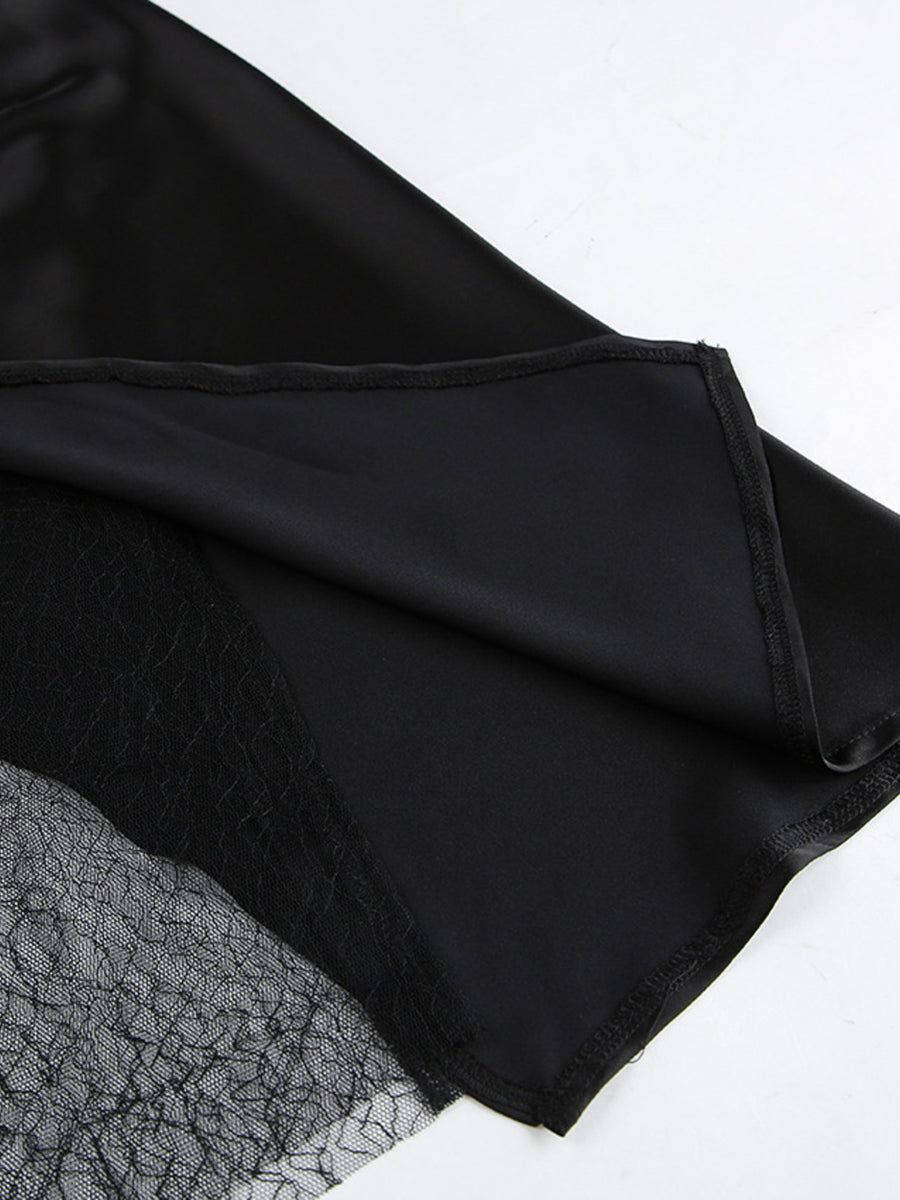 Black fabric with lace trim on a white background