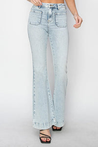 Light blue jeans with a high slit on a white background
