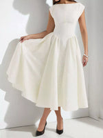 White dress worn by a person on a white background