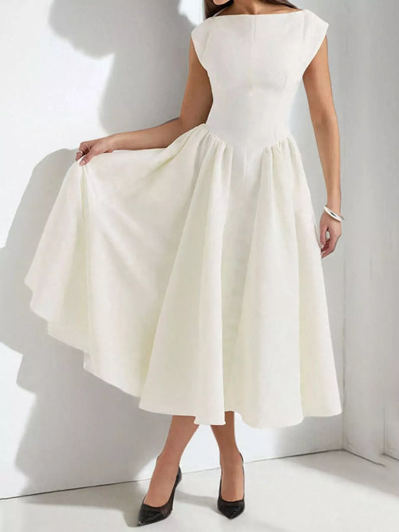 White dress worn by a person on a white background