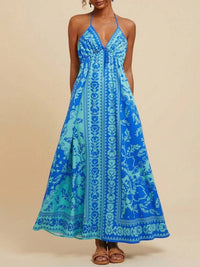 Blue patterned dress on a beige background