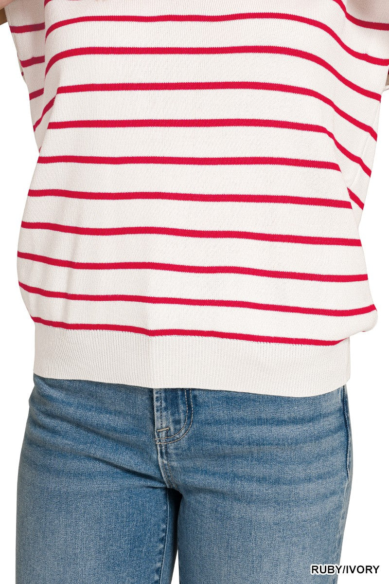 White t-shirt with red stripes and blue jeans on a white background