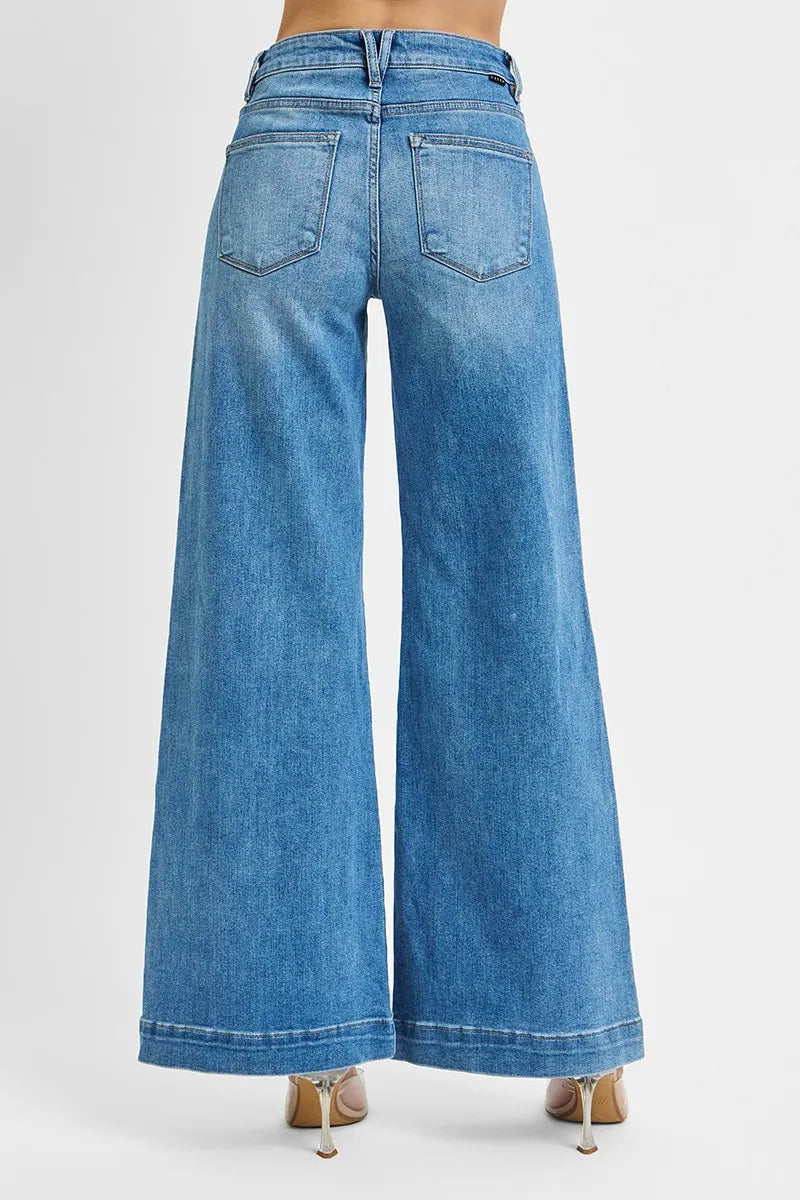 Blue wide-leg jeans on a white background