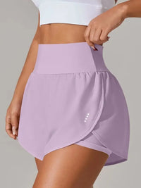 Person wearing a light purple athletic skirt on a plain background