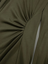 Close-up of olive green fabric with a knot detail