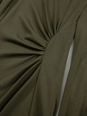 Close-up of olive green fabric with a knot detail