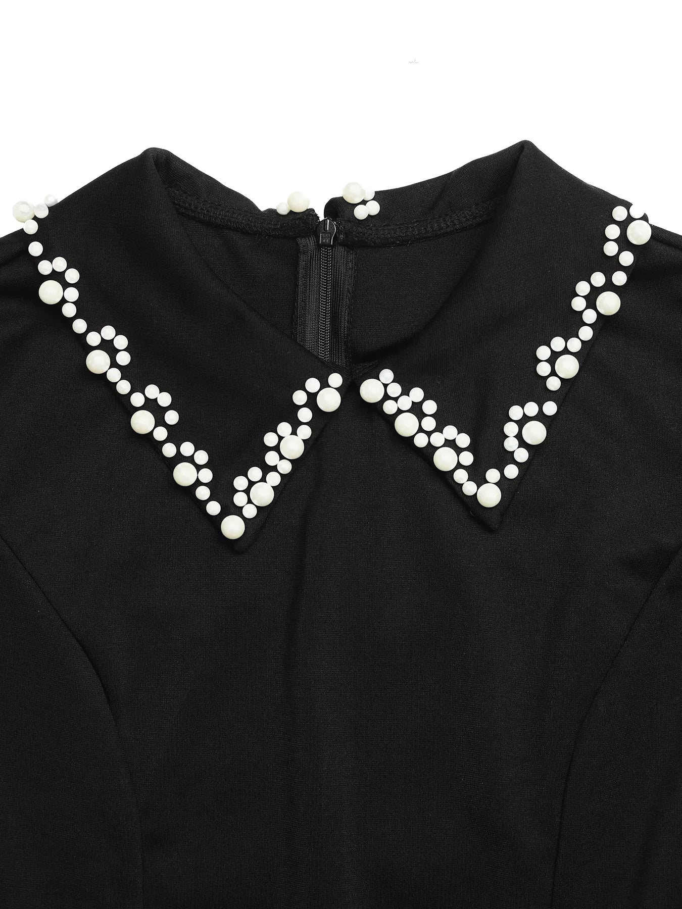 Black garment with a decorative white pearl collar on a white background