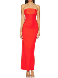 Red strapless gown on a white background