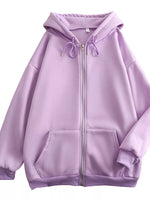 A light purple/lavender zip-up hoodie with a drawstring hood, front pockets, and ribbed cuffs and hem, shown on a plain white background.