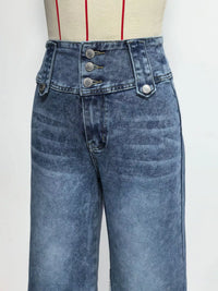 Blue jeans on a mannequin with a white background