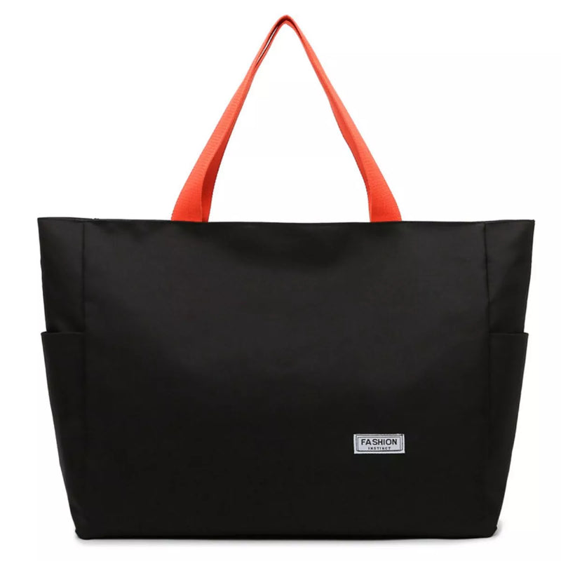 Black tote bag with orange handles on a white background
