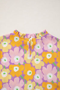 Floral patterned fabric with colorful flowers on a white background