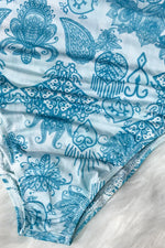 Blue patterned fabric on a marble surface