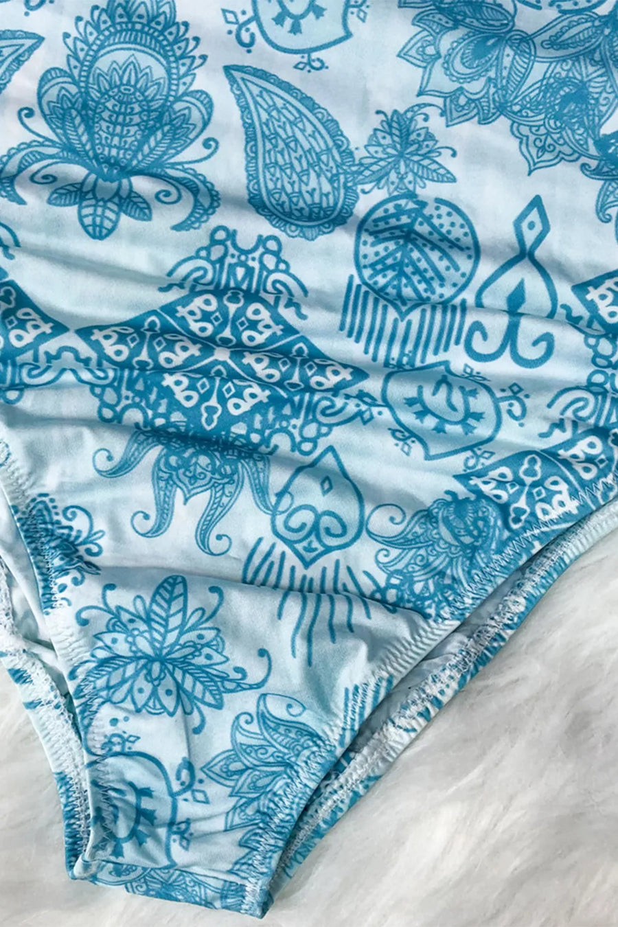 Blue patterned fabric on a marble surface