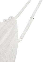 White textured bag with a strap on a white background